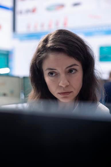 Woman working at a computer on local SEO and AI search optimization strategies, representing Droved’s digital marketing expertise in helping service businesses grow through Google Maps and AI platforms.
