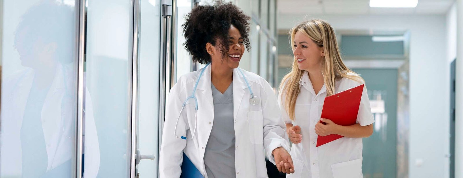 Emergency healthcare professionals collaborating in a hospital corridor, with Droved’s local SEO and AI search optimization helping medical clinics and urgent care providers appear in Google Maps and AI platforms to attract more patients.